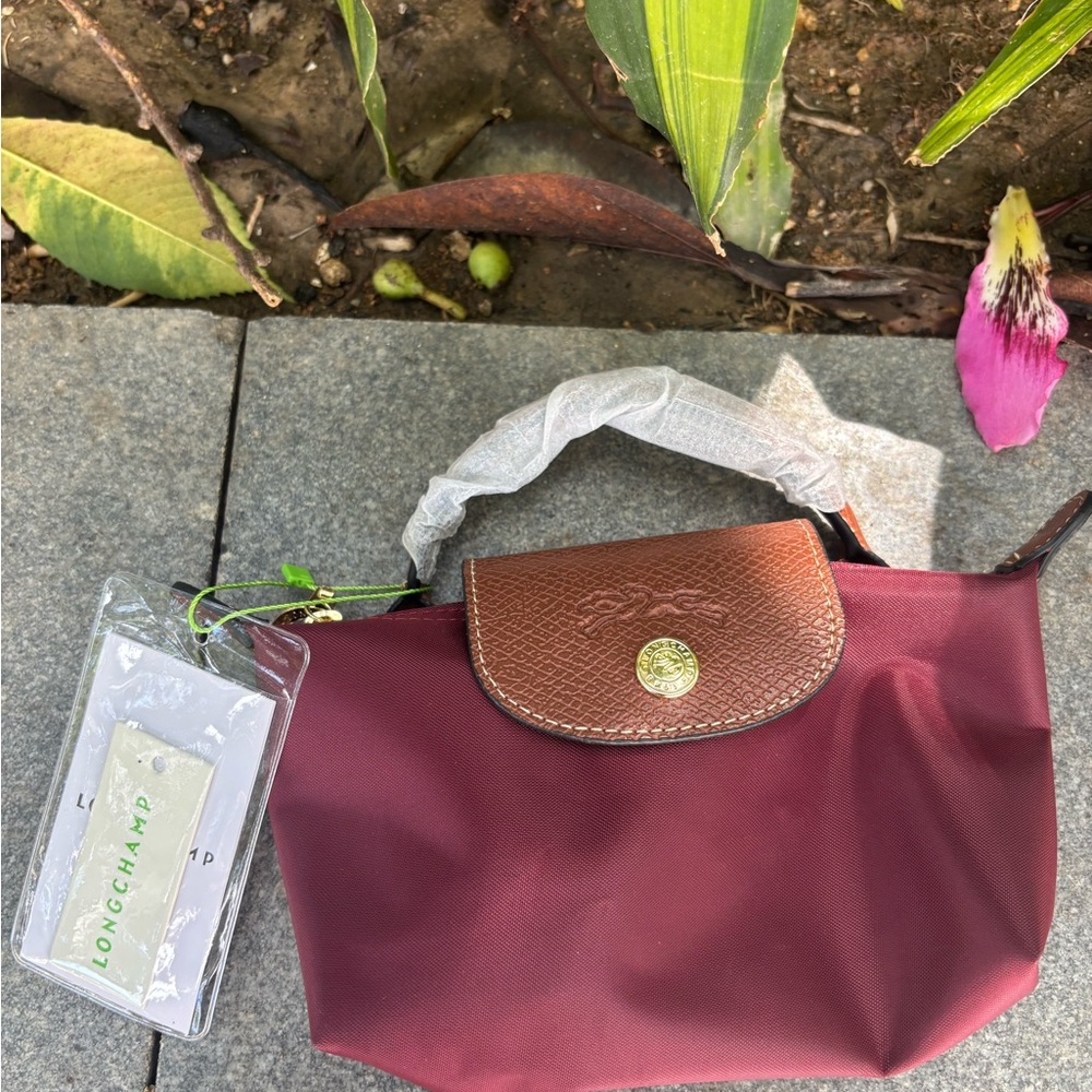 Longchamp Mini Le Pliage Nylon Bag in Burgundy with Brown Trim and Gold Hardware